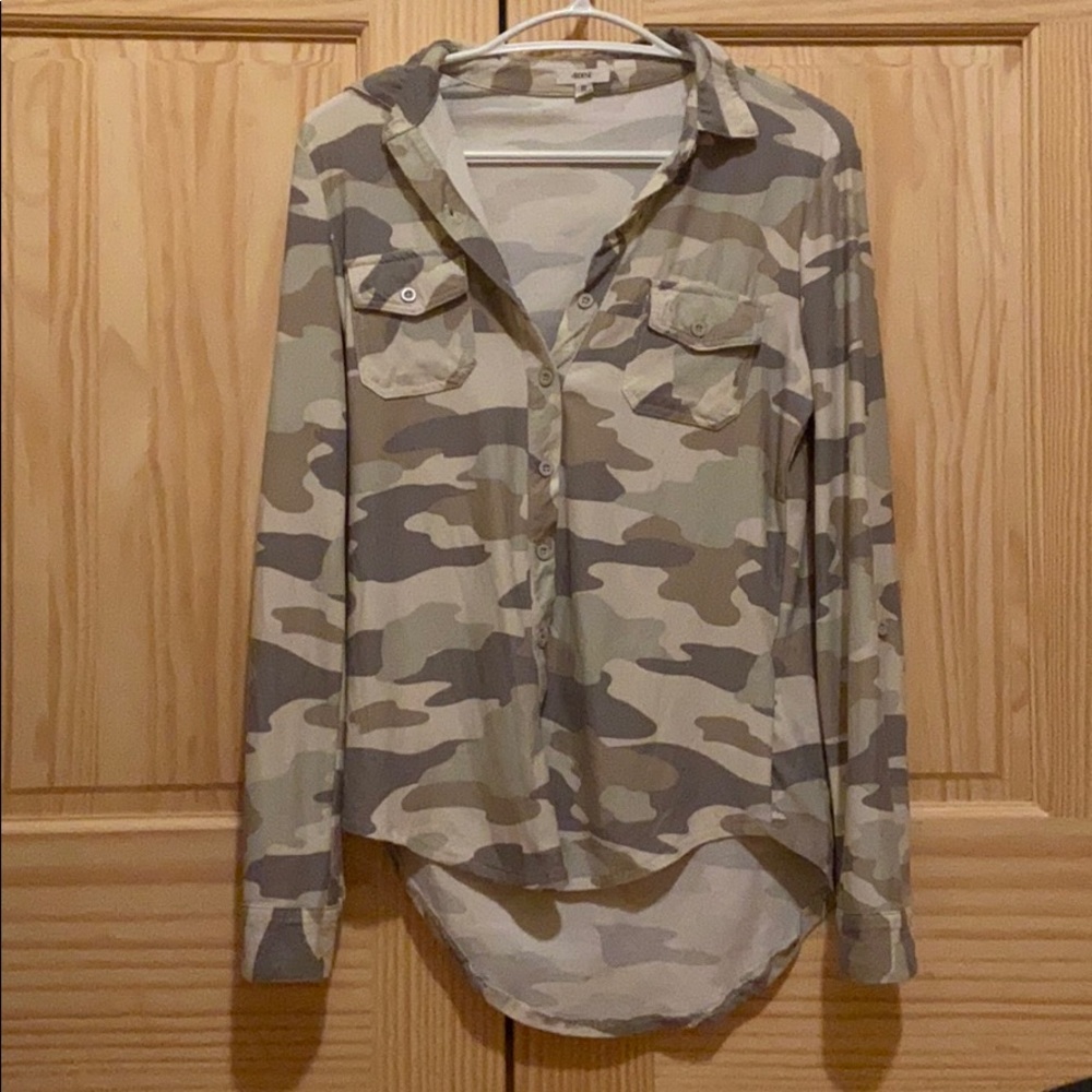 Camouflage button up long sleeve shirt.